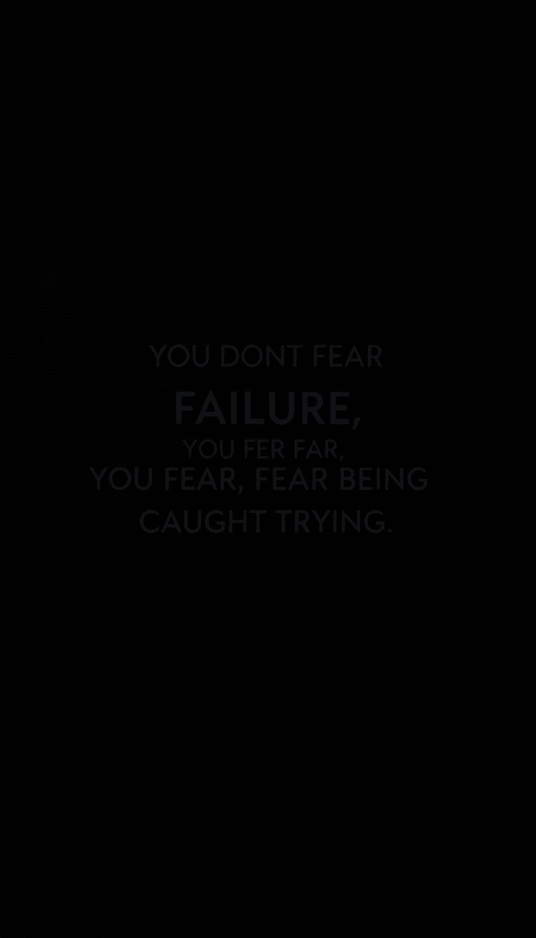 A Dark Themed Simple Minimalistic Wallpaper Saying "you Dont Fear Failure, You Fear Being Caught Trying"